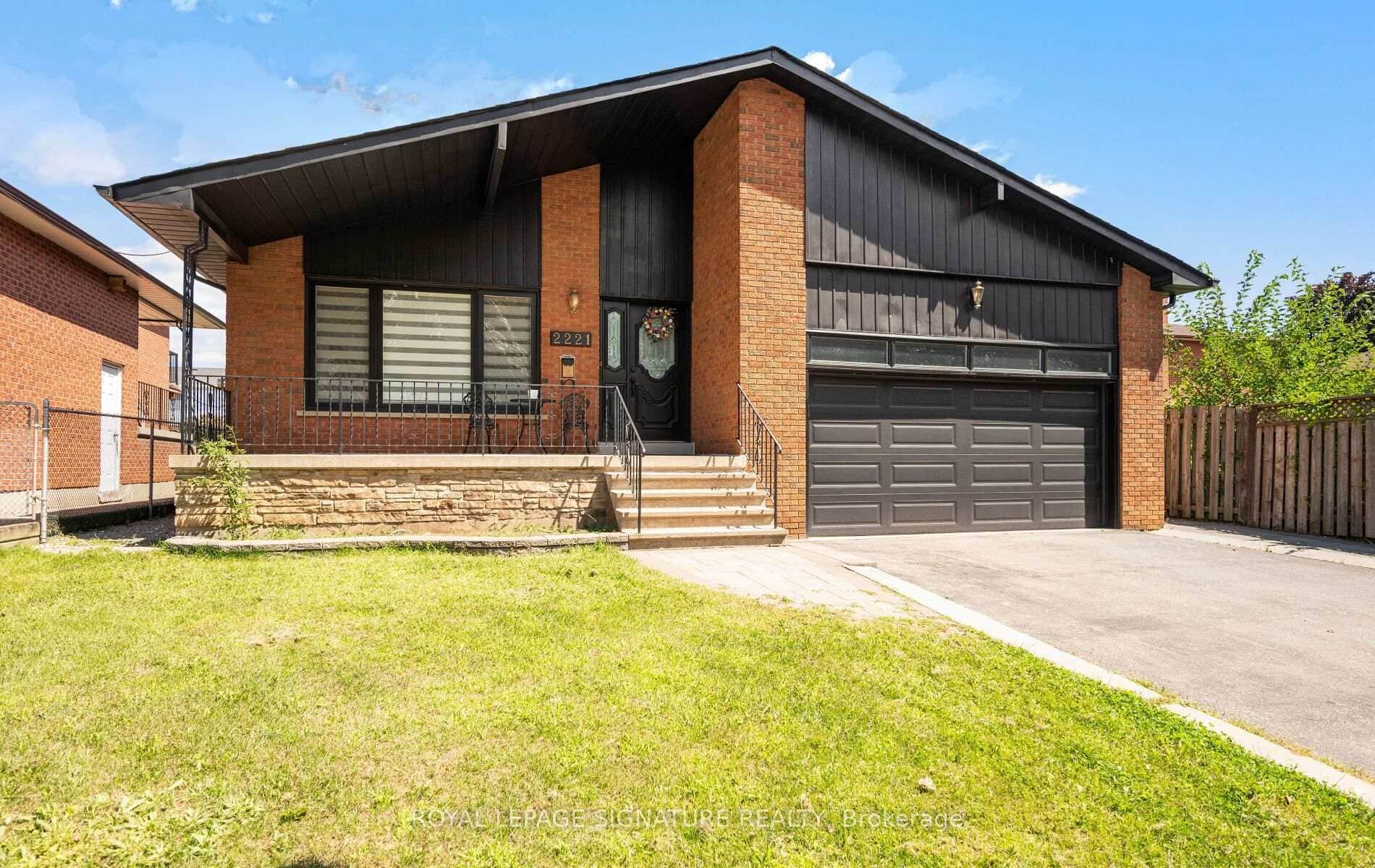Front of Home W/ Extended Driveway & Double Garage