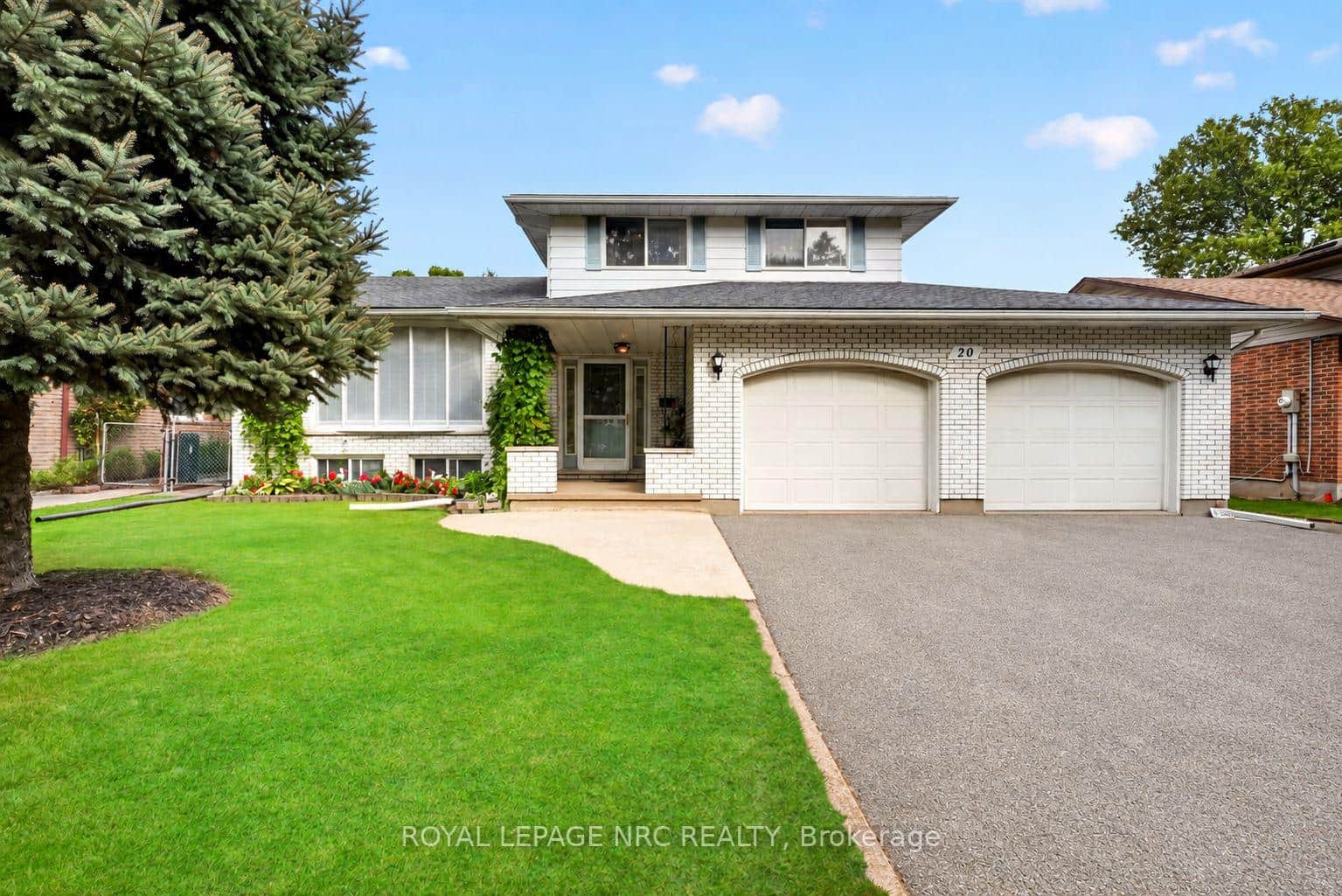 Front Exterior and Six-Car Driveway