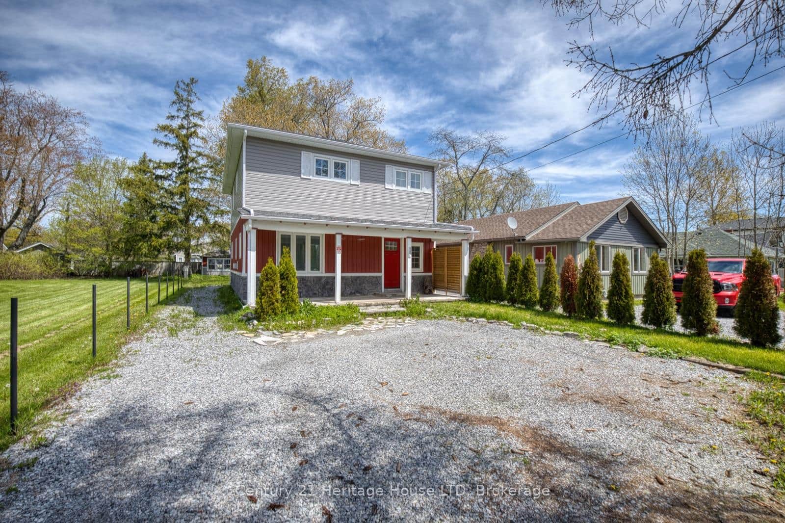 Front Exterior - Private driveway & Covered Porch