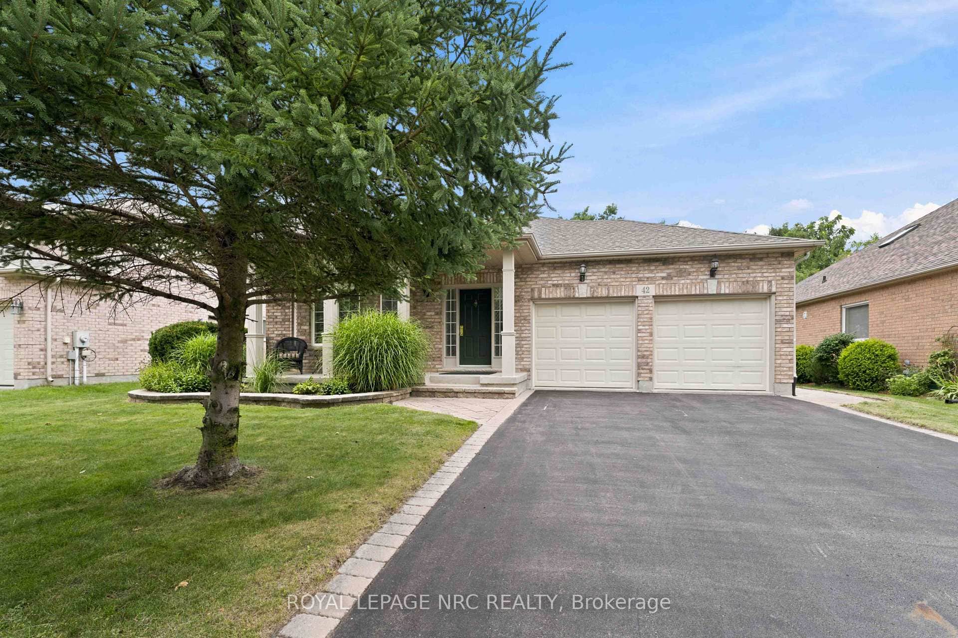 Front Exterior, All Brick, Double Car Garage