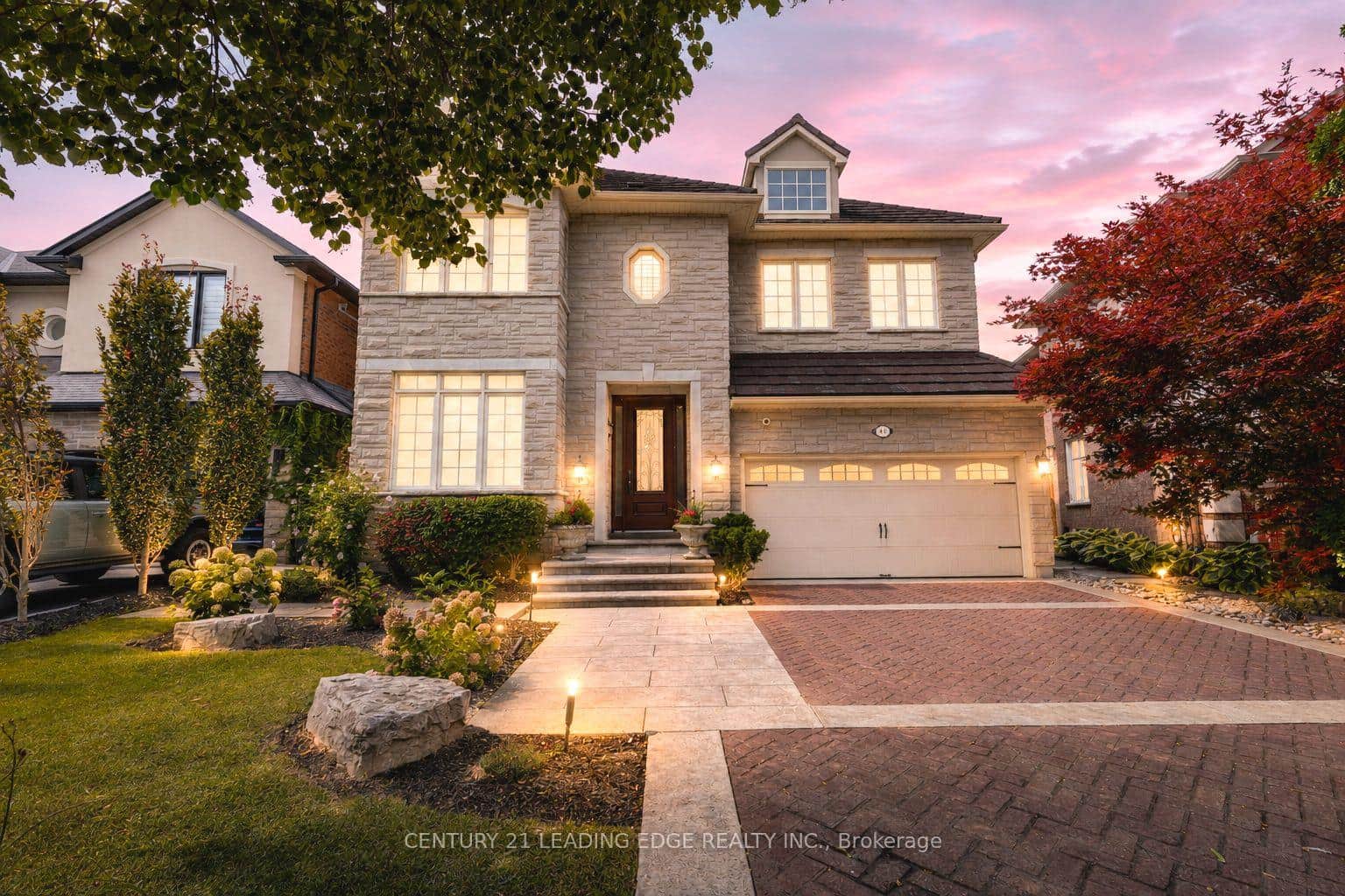 Stone facade, heated driveway, 6 total car parking