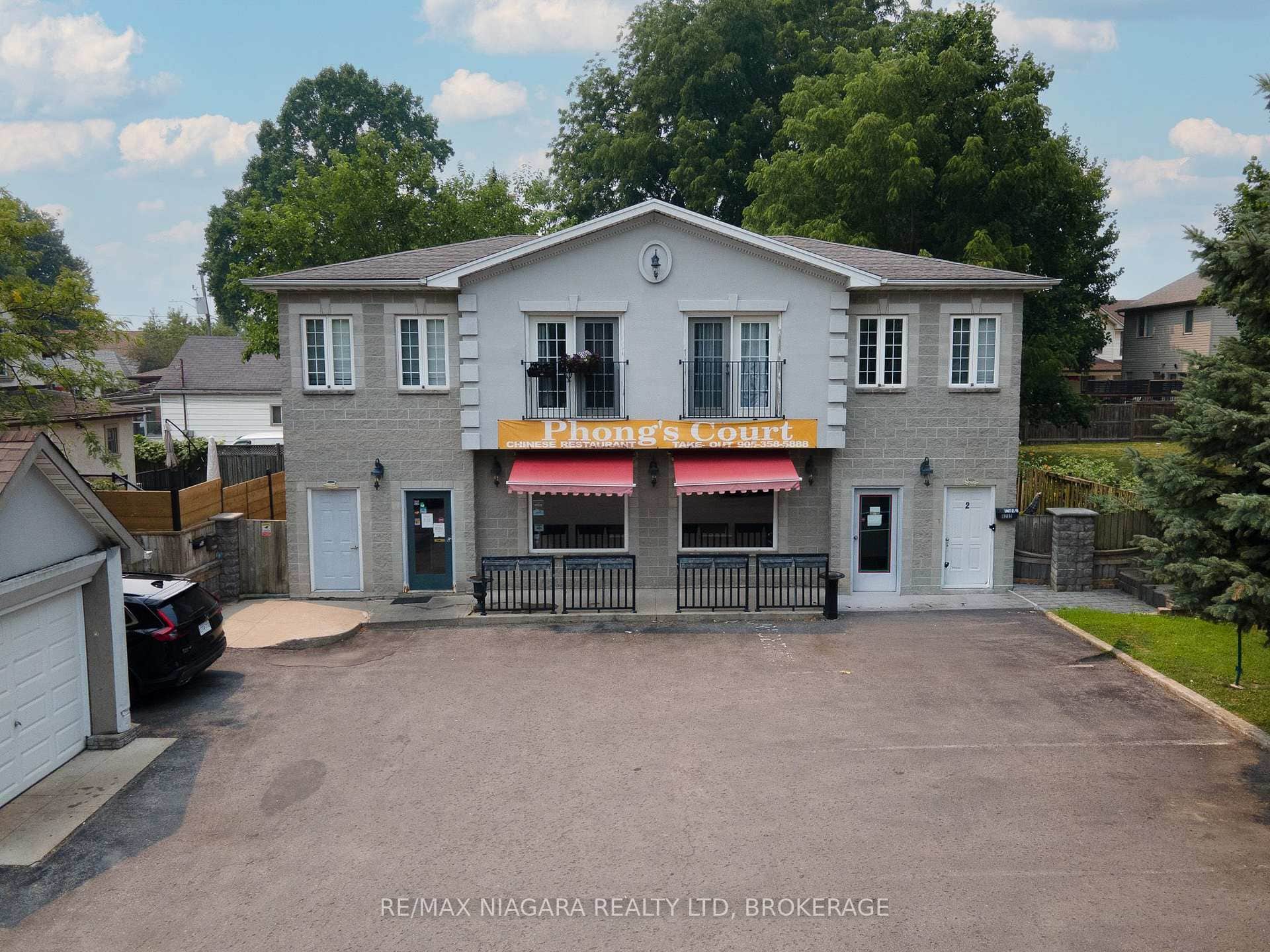 BUILDING 1: 2 RESIDENTIAL RENTALS AND 1 COMMERCIAL