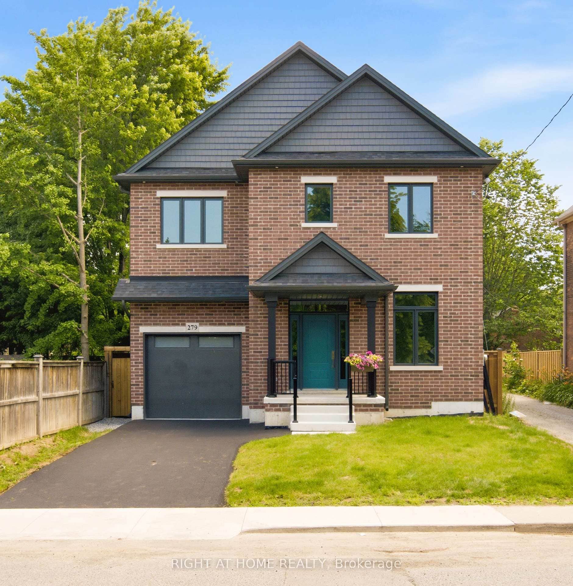 279 Hess St. S Front Exterior full brick w/ garage